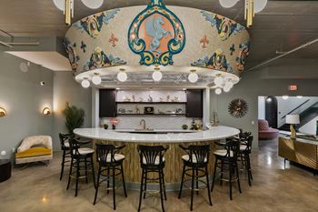 Grand circular bar under ornate dome ceiling